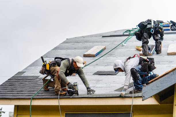 Professional Roof Replacement technician working in Foster, RI